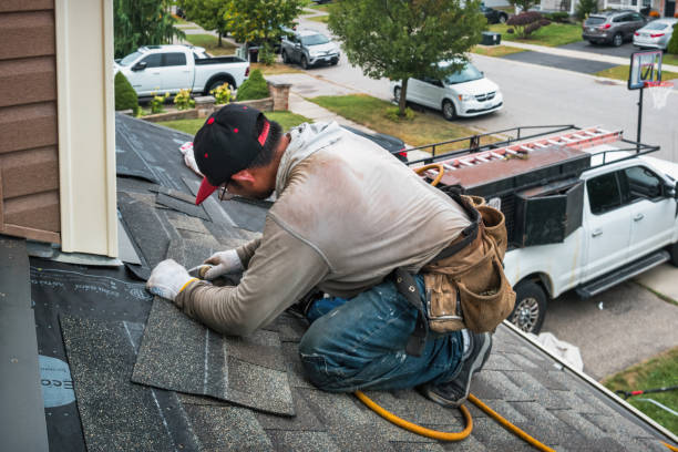 Professional Roofing technician working in Peru, IN